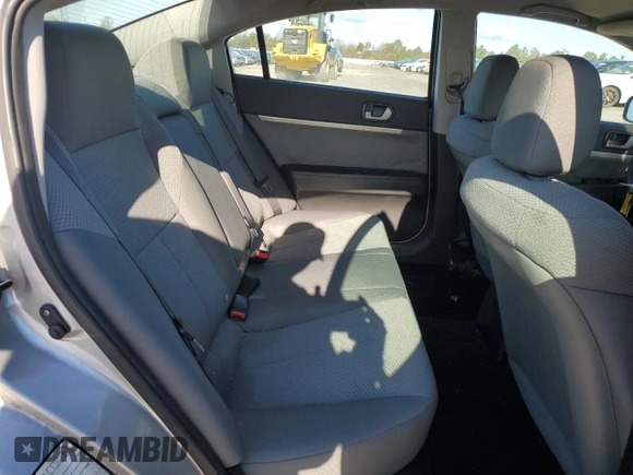 2011 Mitsubishi Galant FE z VIN 4A32B2FF4BE019972, wystawiony jako Copart lot #50345915 z przebiegiem 114 636 mil mil oraz Szkoda całkowita • Salvage title. Historia ofert i sprzedaży dostępna na DreamBid. Obrazek 10.