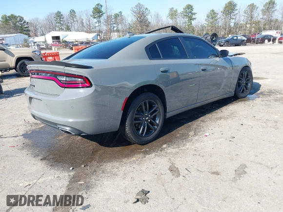 2019 Dodge Charger SXT with VIN 2C3CDXJG1KH537825, listed as a IAAI auction lot 41482387 with 71,062 mi miles and . Bid and sale history available at DreamBid. Image 4.