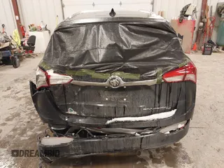 2019 Buick Envision Essence with VIN LRBFX2SA5KD042858, listed as a IAAI auction lot 41578001 with 32,524 mi miles and . Bid and sale history available at carsss.com. Image 6.