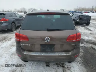 2012 Volkswagen Touareg Sport z VIN WVGEF9BP8CD006057, wystawiony jako Copart lot #47739265 z przebiegiem 213 580 mil mil oraz Szkoda całkowita • Salvage title. Historia ofert i sprzedaży dostępna na DreamBid. Obrazek 6.