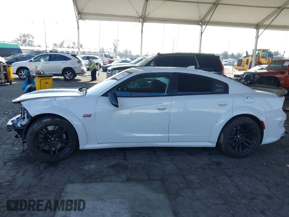 2023 Dodge Charger Scat Pack Widebody with VIN 2C3CDXGJ6PH635498, listed as a IAAI auction lot 41448100 with 13,678 mi miles and . Bid and sale history available at DreamBid. Image 15.
