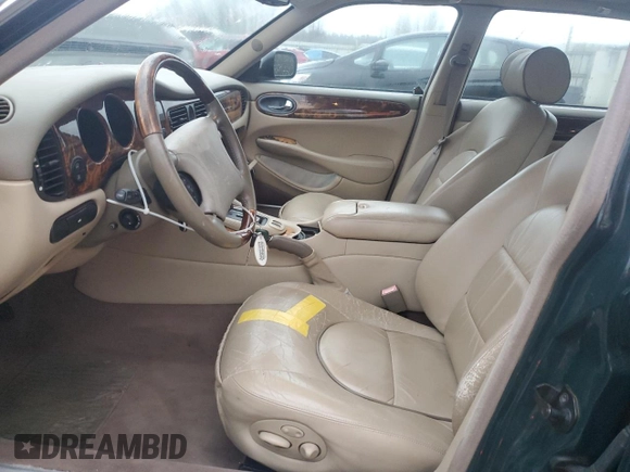 2000 Jaguar XJ with VIN SAJDA25BXYMF01667, listed as a Copart auction lot 41333495 with 102,291 mi miles and Clean Title. Bid and sale history available at DreamBid. Image 7.