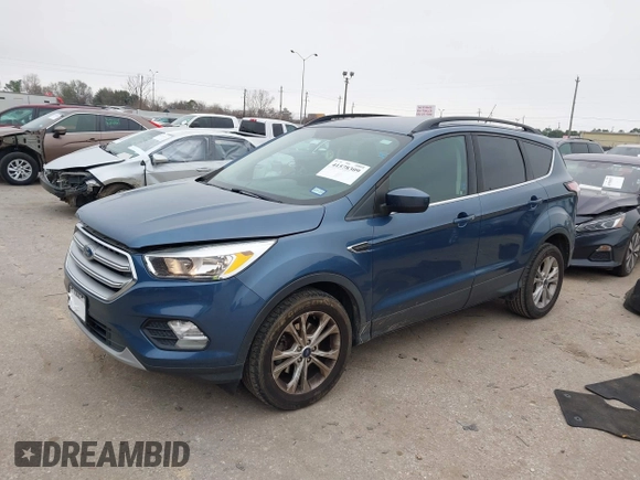 2018 Ford Escape SE with VIN 1FMCU0GD0JUC58115, listed as a IAAI auction lot 41578309 with 76,162 mi miles. Bid and sale history available at carsss.com. Image 2.