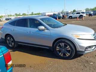 2013 Honda Crosstour EX-L z VIN 5J6TF2H56DL002499, wystawiony jako IAAI lot #42349382 z przebiegiem 174 542 mil mil oraz . Historia ofert i sprzedaży dostępna na DreamBid. Obrazek 13.