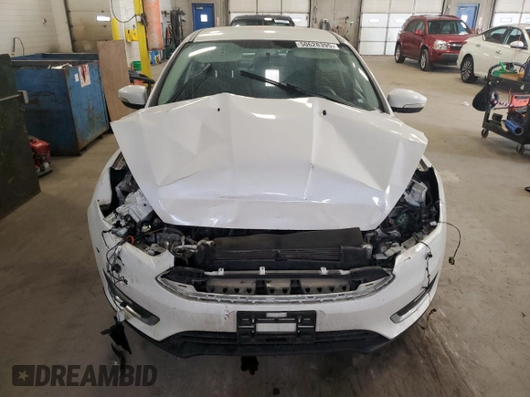 2015 Ford Focus Titanium с VIN 1FADP3J28FL385528, выставлен на аукционе Copart как лот 50628395 с пробегом 92 323 миль миль и На запчасти • Non repairable. История ставок и продаж доступна на DreamBid. Изображение 5.