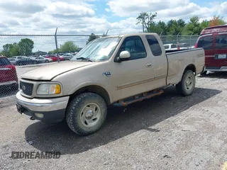 2000 Ford F-150 XL with VIN 1FTRX18L9YNB70363, listed as a IAAI auction lot 42140312 with 226,686 mi miles and . Bid and sale history available at DreamBid. Image 2.