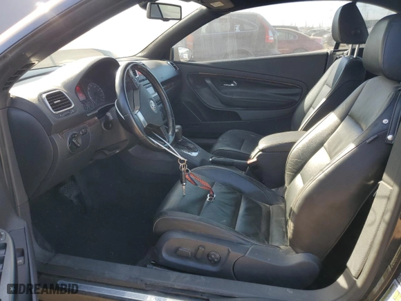 2009 Volkswagen Eos Lux with VIN WVWFA71F99V011940, listed as a Copart auction lot 48558885 with 75,242 mi miles and Salvage Title. Bid and sale history available at carsss.com. Image 7.