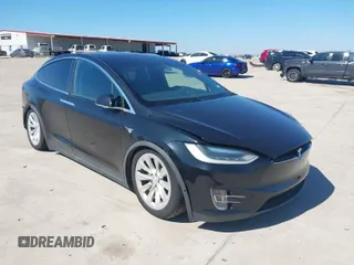 2017 Tesla Model X 90D with VIN 5YJXCAE28HF059140, listed as a IAAI auction lot 41648518 with Not Provided miles and . Bid and sale history available at DreamBid. Image 1.