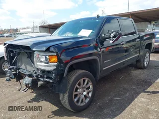 2014 GMC Sierra 1500 Denali z VIN 3GTU2WEC6EG401458, wystawiony jako IAAI lot #41935704 z przebiegiem 149 136 mil mil oraz . Historia ofert i sprzedaży dostępna na DreamBid. Obrazek 18.