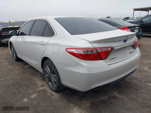 2015 Toyota Camry Hybrid LE with VIN 4T1BD1FK0FU175597, listed as a IAAI auction lot 41455315 with 116,380 mi miles. Bid and sale history available at carsss.com. Image 3.