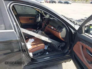 2015 BMW 5 Series 535i xDrive with VIN WBA5B3C58FD544141, listed as a IAAI auction lot 41702930 with 1 mi miles. Bid and sale history available at carsss.com. Image 5.