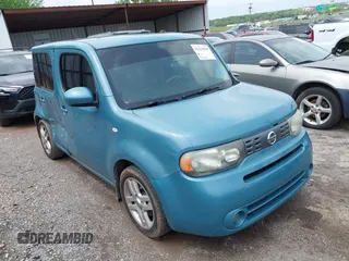 2011 Nissan Cube SL z VIN JN8AZ2KR8BT214693, wystawiony jako IAAI lot #42138510 z przebiegiem 218 225 mil mil oraz . Historia ofert i sprzedaży dostępna na DreamBid. Obrazek 1.