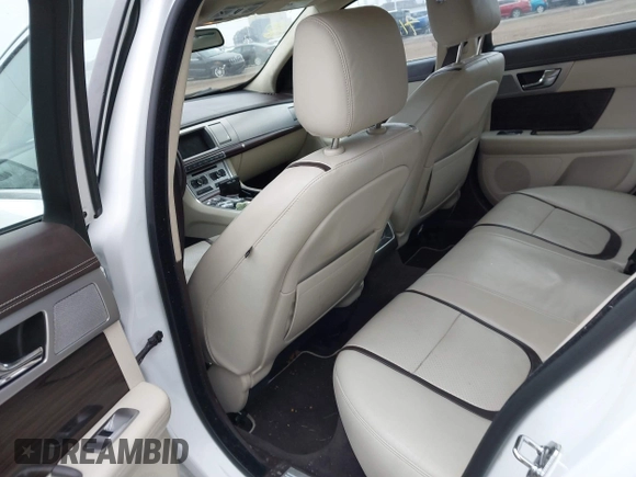 2015 Jaguar XF V6 Portfolio with VIN SAJWJ0FF2F8U59934, listed as a IAAI auction lot 41558305 with 120,219 mi miles. Bid and sale history available at carsss.com. Image 8.