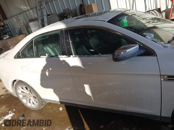 2015 Ford Taurus Limited z VIN 1FAHP2F88FG125499, wystawiony jako IAAI lot #41343023 z przebiegiem 126 047 mil mil oraz . Historia ofert i sprzedaży dostępna na DreamBid. Obrazek 14.