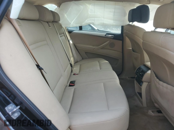 2012 BMW X5 35i with VIN 5UXZV4C5XCL761370, listed as a Copart auction lot 59436845 with 124,722 mi miles and Salvage title. Bid and sale history available at DreamBid. Image 11.