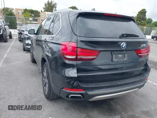 2018 BMW X5 xDrive35i with VIN 5UXKR0C55JL073210, listed as a IAAI auction lot 42047558 with 37,497 mi miles. Bid and sale history available at carsss.com. Image 3.