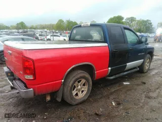 2005 Dodge Ram 1500 SLT with VIN 1D7HA18N65J600227, listed as a IAAI auction lot 41879270 with 338,592 mi miles. Bid and sale history available at carsss.com. Image 4.