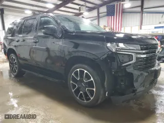2022 Chevrolet Tahoe RST with VIN 1GNSKRKD5NR297672, listed as a Copart auction lot 48493325 with 34,989 mi miles and Salvage Title. Bid and sale history available at carsss.com. Image 4.