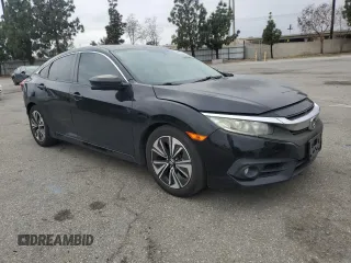 2016 Honda Civic EX-T z VIN 2HGFC1F33GH634029, wystawiony jako Copart lot #56026045 z przebiegiem 168 676 mil mil oraz Szkoda całkowita • Salvage title. Historia ofert i sprzedaży dostępna na DreamBid. Obrazek 4.