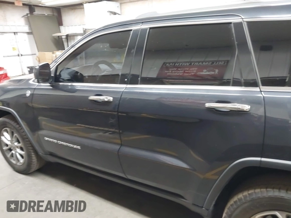 2014 Jeep Grand Cherokee Limited z VIN 1C4RJFBG6EC545417, wystawiony jako IAAI lot #42288236 z przebiegiem 130 229 mil mil oraz . Historia ofert i sprzedaży dostępna na DreamBid. Obrazek 15.