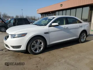 2016 Ford Taurus SEL with VIN 1FAHP2H89GG122884, listed as a Copart auction lot 53597595 with 128,627 mi miles and Salvage title. Bid and sale history available at DreamBid. Image 1.