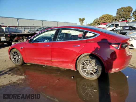2018 Tesla Model 3 Long Range Battery with VIN 5YJ3E1EAXJF047285, listed as a Copart auction lot 87875175 with 114,896 mi miles and Salvage Title. Bid and sale history available at DreamBid. Image 2.