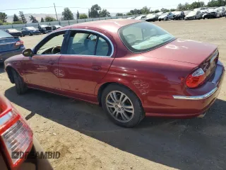 2003 Jaguar S-Type z VIN SAJEA01U13HM90556, wystawiony jako Copart lot #59578535 z przebiegiem 50 723 mil mil oraz Czysty tytuł • Clean title. Historia ofert i sprzedaży dostępna na DreamBid. Obrazek 2.
