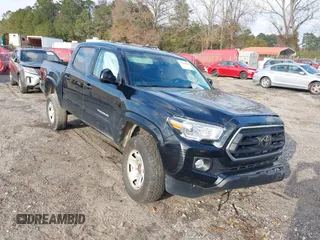 2023 Toyota Tacoma SR with VIN 3TYAX5GN5PT070460, listed as a IAAI auction lot 41106863 with 57,969 mi miles and . Bid and sale history available at DreamBid. Image 1.