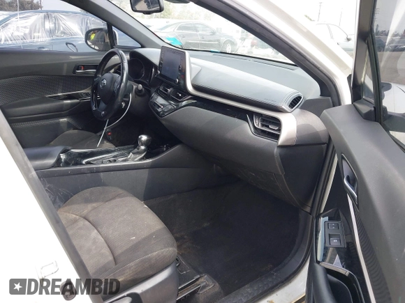 2019 Toyota C-HR XLE with VIN JTNKHMBX9K1054053, listed as a IAAI auction lot 42120256 with 67,083 mi miles and . Bid and sale history available at DreamBid. Image 5.