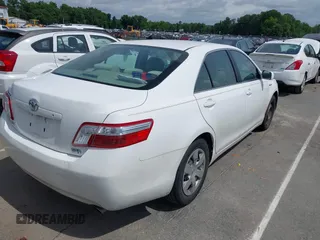 2009 Toyota Camry z VIN 4T1BB46K59U099788, wystawiony jako IAAI lot #42400201 z przebiegiem 306 266 mil mil oraz . Historia ofert i sprzedaży dostępna na DreamBid. Obrazek 4.