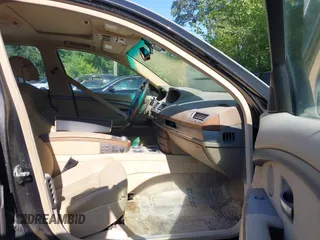 2004 BMW 7 Series 745Li with VIN WBAGN63594DS54487, listed as a IAAI auction lot 42497386 with 125,813 mi miles and . Bid and sale history available at DreamBid. Image 5.