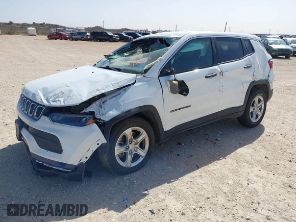 2023 Jeep Compass Sport with VIN 3C4NJDAN8PT564612, listed as a IAAI auction lot 41639296 with 54,463 mi miles and . Bid and sale history available at DreamBid. Image 2.