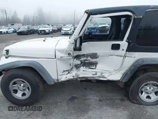 2006 Jeep Wrangler Sport Right Hand Drive with VIN 1J4F449S16P709895, listed as a IAAI auction lot 41349311 with 157,125 mi miles. Bid and sale history available at carsss.com. Image 6.