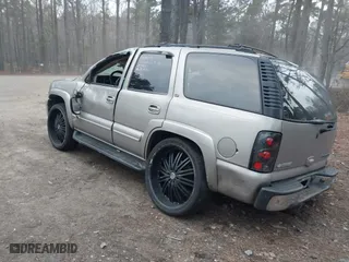 2003 Chevrolet Tahoe LT with VIN 1GNEC13Z73J206953, listed as a IAAI auction lot 41257879 with 186,590 mi miles. Bid and sale history available at carsss.com. Image 3.