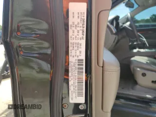2013 Jeep Grand Cherokee Laredo with VIN 1C4RJEAG2DC519570, listed as a Copart auction lot 52066225 with 129,091 mi miles and Salvage Title. Bid and sale history available at carsss.com. Image 14.