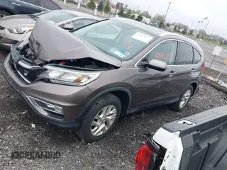 2015 Honda CR-V EX-L with VIN 2HKRM4H79FH616991, listed as a IAAI auction lot 42155337 with 114,850 mi miles. Bid and sale history available at carsss.com. Image 2.