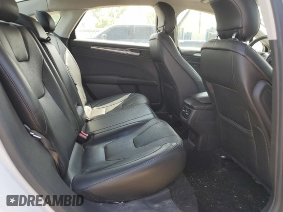 2014 Ford Fusion Titanium с VIN 3FA6P0K97ER293233, выставлен на аукционе Copart как лот 54256985 с пробегом 111 854 миль миль и Списание • Salvage title. История ставок и продаж доступна на DreamBid. Изображение 10.