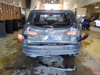 2020 Honda Pilot Touring 7-Passenger z VIN 5FNYF6H67LB031880, wystawiony jako Copart lot #46083925 z przebiegiem 59 729 mil mil oraz Szkoda całkowita • Salvage title. Historia ofert i sprzedaży dostępna na DreamBid. Obrazek 6.
