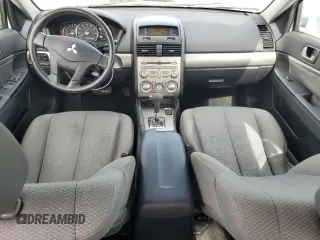 2011 Mitsubishi Galant FE z VIN 4A32B2FF9BE016985, wystawiony jako Copart lot #68641474 z przebiegiem 184 975 mil mil oraz Nie do naprawy • Non repairable. Historia ofert i sprzedaży dostępna na DreamBid. Obrazek 8.