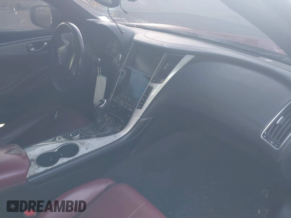 2018 Infiniti Q60 Red Sport 400 with VIN JN1FV7EL1JM630095, listed as a IAAI auction lot 41212992 with 97,970 mi miles and . Bid and sale history available at DreamBid. Image 5.