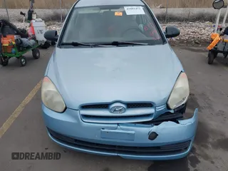 2007 Hyundai Accent GS with VIN KMHCM36CX7U006584, listed as a IAAI auction lot 41801452 with 1 mi miles. Bid and sale history available at carsss.com. Image 12.