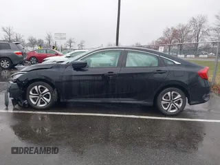 2018 Honda Civic LX with VIN 2HGFC2F54JH548274, listed as a IAAI auction lot 41864457 with 60,905 mi miles and . Bid and sale history available at DreamBid. Image 14.