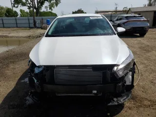 2024 Kia Forte LXS with VIN 3KPF24AD6RE818009, listed as a Copart auction lot 53334185 with 15,842 mi miles and Clean Title. Bid and sale history available at carsss.com. Image 5.