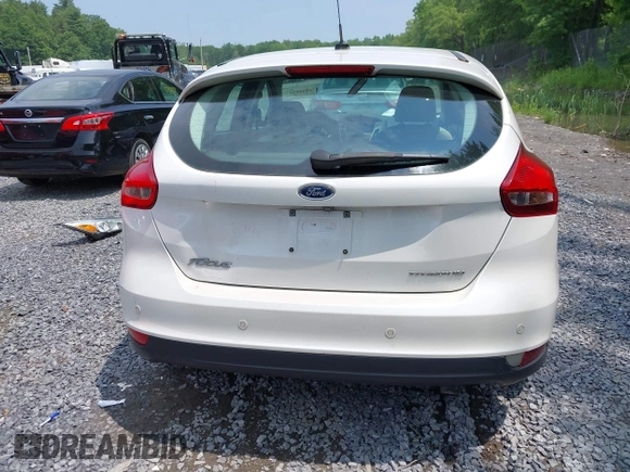 2016 Ford Focus Titanium with VIN 1FADP3N26GL332709, listed as a IAAI auction lot 42458997 with 75,509 mi miles and . Bid and sale history available at DreamBid. Image 16.