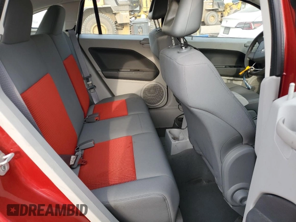 2007 Dodge Caliber SXT z VIN 1B3HB48B07D580803, wystawiony jako Copart lot #76931074 z przebiegiem 146 833 mil mil oraz Szkoda całkowita • Salvage title. Historia ofert i sprzedaży dostępna na DreamBid. Obrazek 10.
