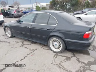 2001 BMW 5 Series 525iA with VIN WBADT43451GX20026, listed as a IAAI auction lot 41490075 with 141,700 mi miles. Bid and sale history available at carsss.com. Image 3.