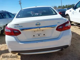 2018 Nissan Altima 2.5 SL with VIN 1N4AL3AP1JC163884, listed as a IAAI auction lot 41645283 with 115,982 mi miles. Bid and sale history available at carsss.com. Image 17.