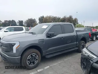2023 Ford F-150 Lightning Pro with VIN 1FTVW1EL8PWG48559, listed as a IAAI auction lot 42033123 with 8,845 mi miles and . Bid and sale history available at DreamBid. Image 14.