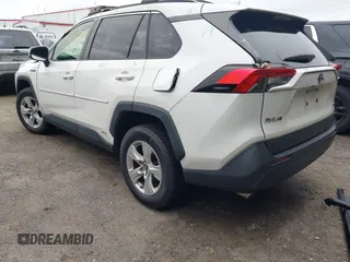 2019 Toyota RAV4 Hybrid LE with VIN JTMMWRFV9KD021285, listed as a IAAI auction lot 42757660 with 74,870 mi miles and . Bid and sale history available at DreamBid. Image 3.
