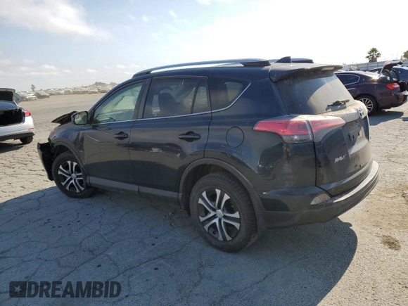 2017 Toyota RAV4 LE with VIN JTMBFREVXHJ146587, listed as a Copart auction lot 64794935 with 92,192 mi miles and Salvage title. Bid and sale history available at DreamBid. Image 2.